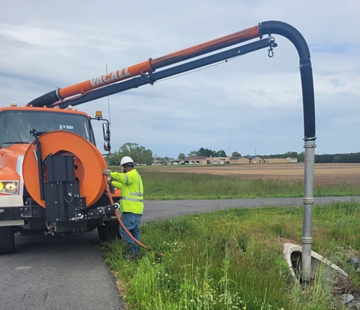 SHA photo: Crews use a vacuum system to deep clean a drainage system on US 113 in Worcester County