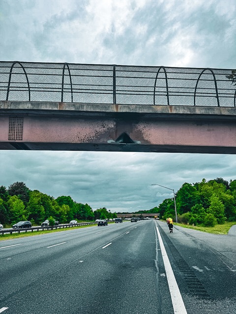Pedestrian bridge damage after being struck by a truck hauling an excavator on the evening of Monday, May 12