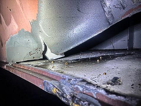 View of a damaged steel section of the pedestrian bridge over US 50 in Bowie