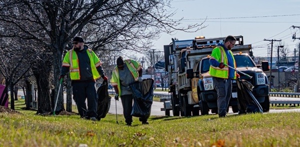 Figure 3: Crews from the Golden Ring Shop picking litter along MD 700 (Martin Boulevard) in eastern Baltimore County. SHA photo